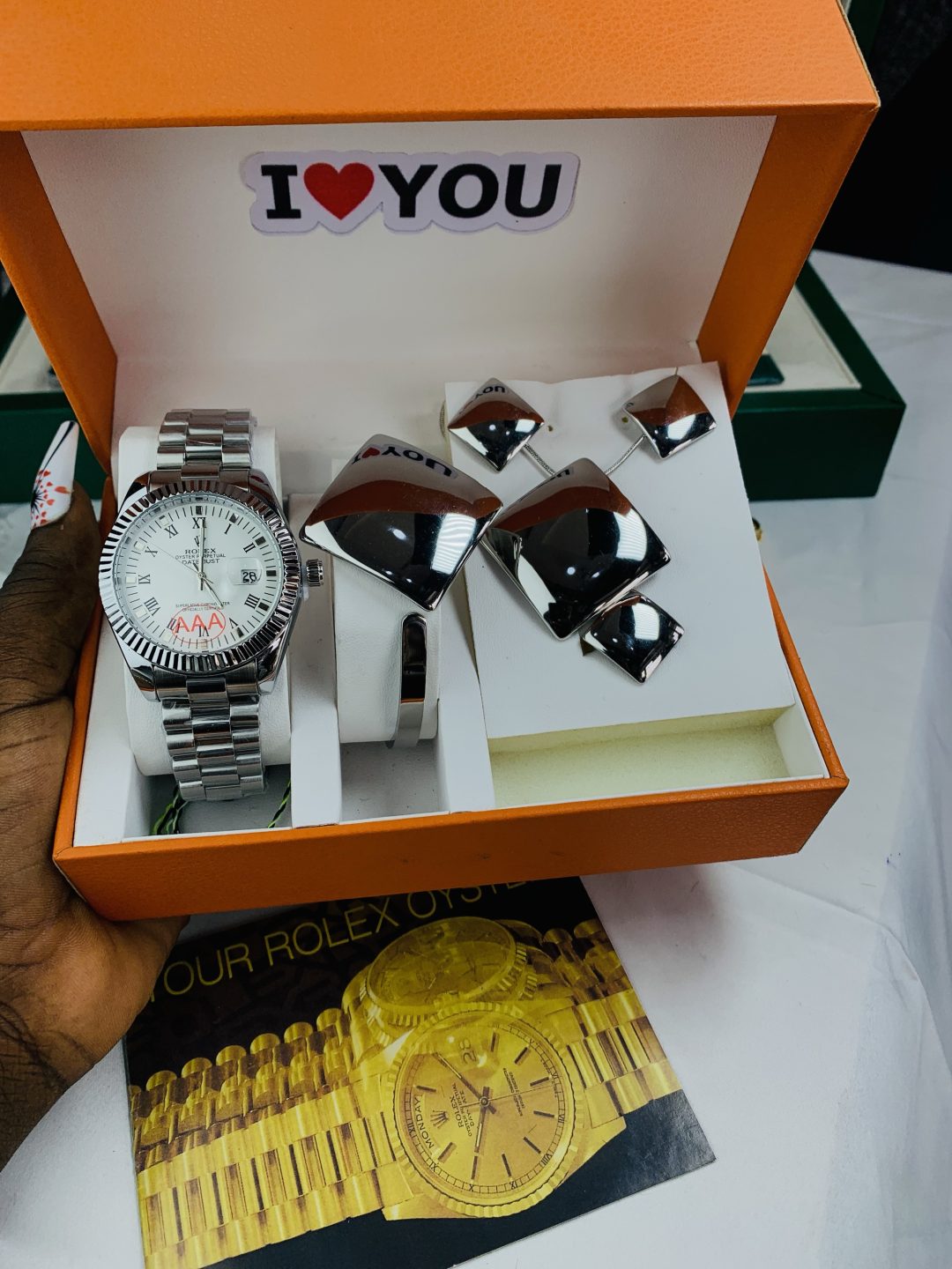 Rolex oyster silver face combo comes with big paper box