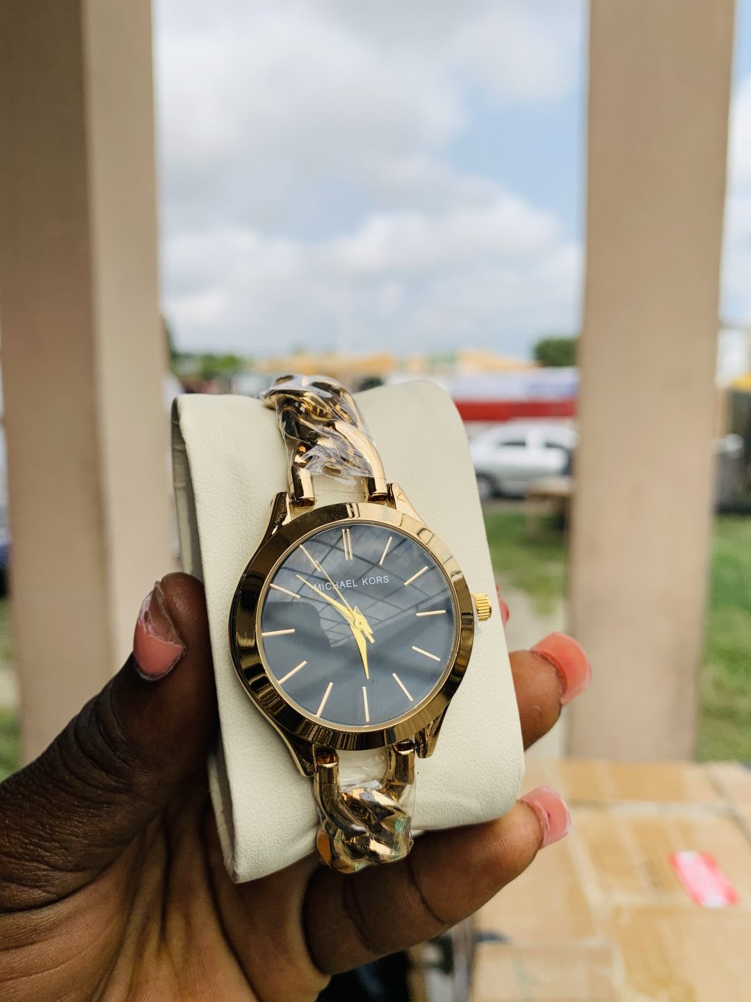 Micheal Kors gold black face
