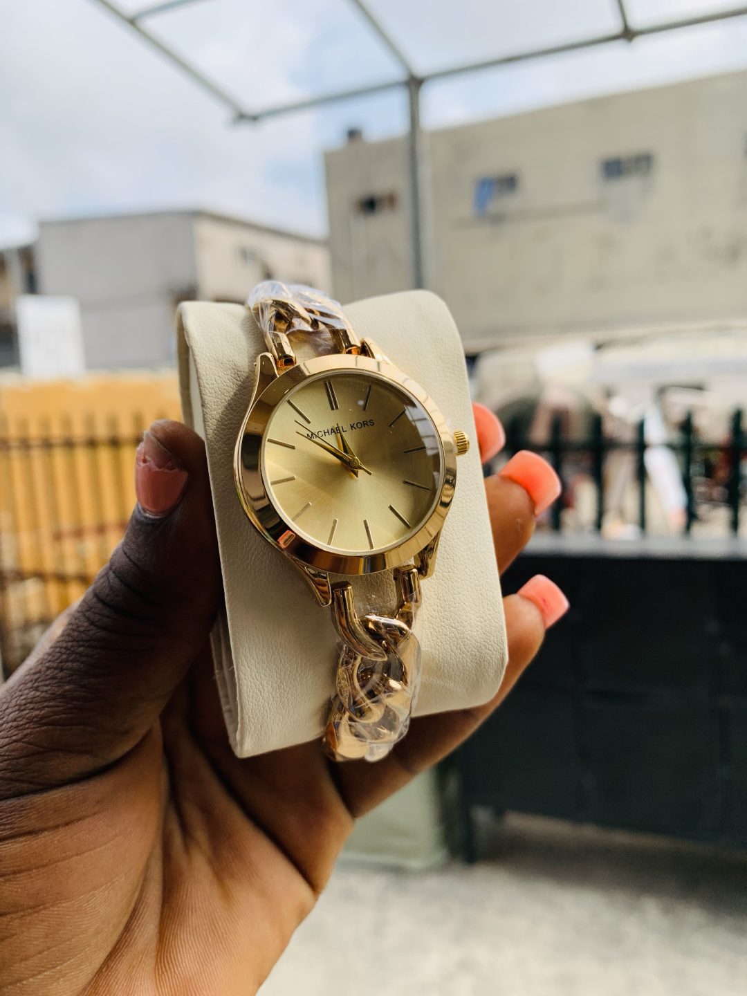 Micheal kors gold gold face
