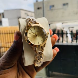 Micheal kors gold gold face