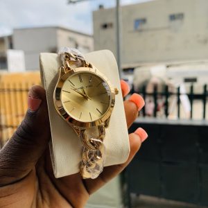 Micheal kors gold gold face