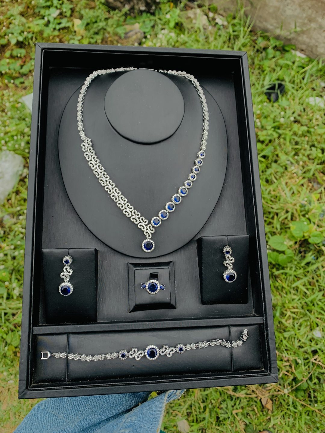 003 zirconia blue stone bridal set
