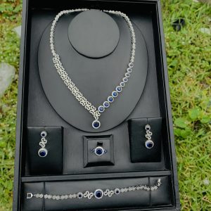 003 zirconia blue stone bridal set