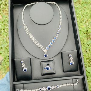 003 zirconia blue stone bridal set
