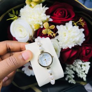 Rebirth pearls gold dropping watch