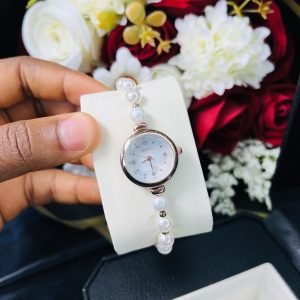 Rebirth pearls rose gold white face dropping watch