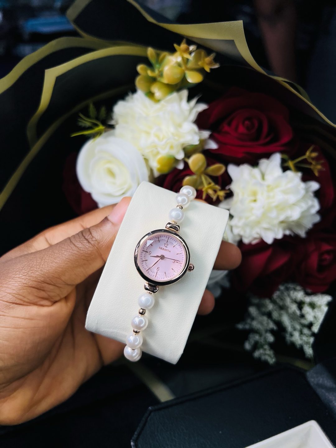 Rebirth pearls rose gold pink face dropping watch