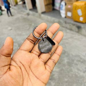 Engraved black circular key holder