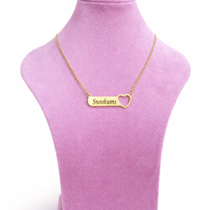 Engraved female necklace with open heart