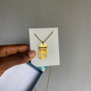 Engraved gold cross dog tag necklace