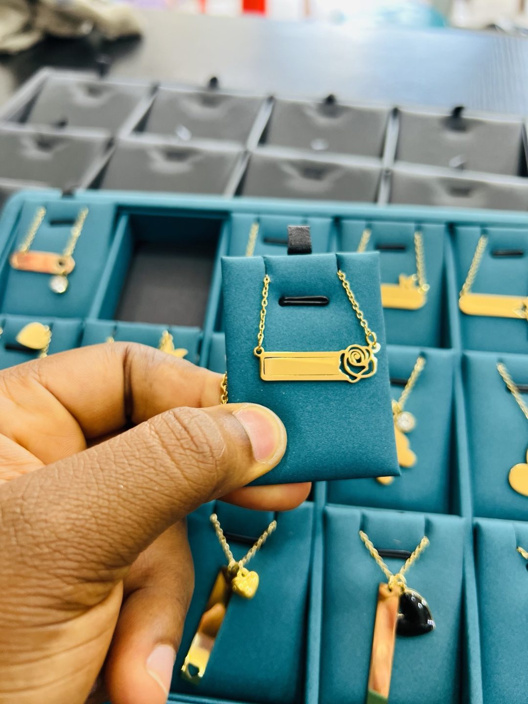 Engraved female rose necklace