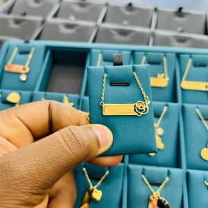 Engraved female rose necklace