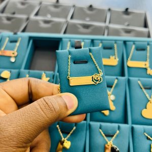 Engraved female rose necklace