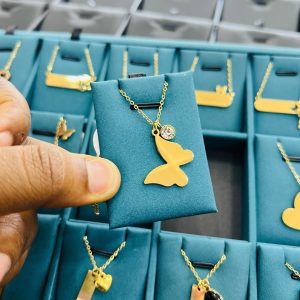 Engraved female butterfly necklace with gemstone