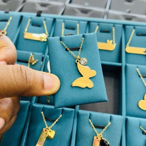 Engraved female butterfly necklace with gemstone