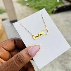 Engraved female necklace with open heart