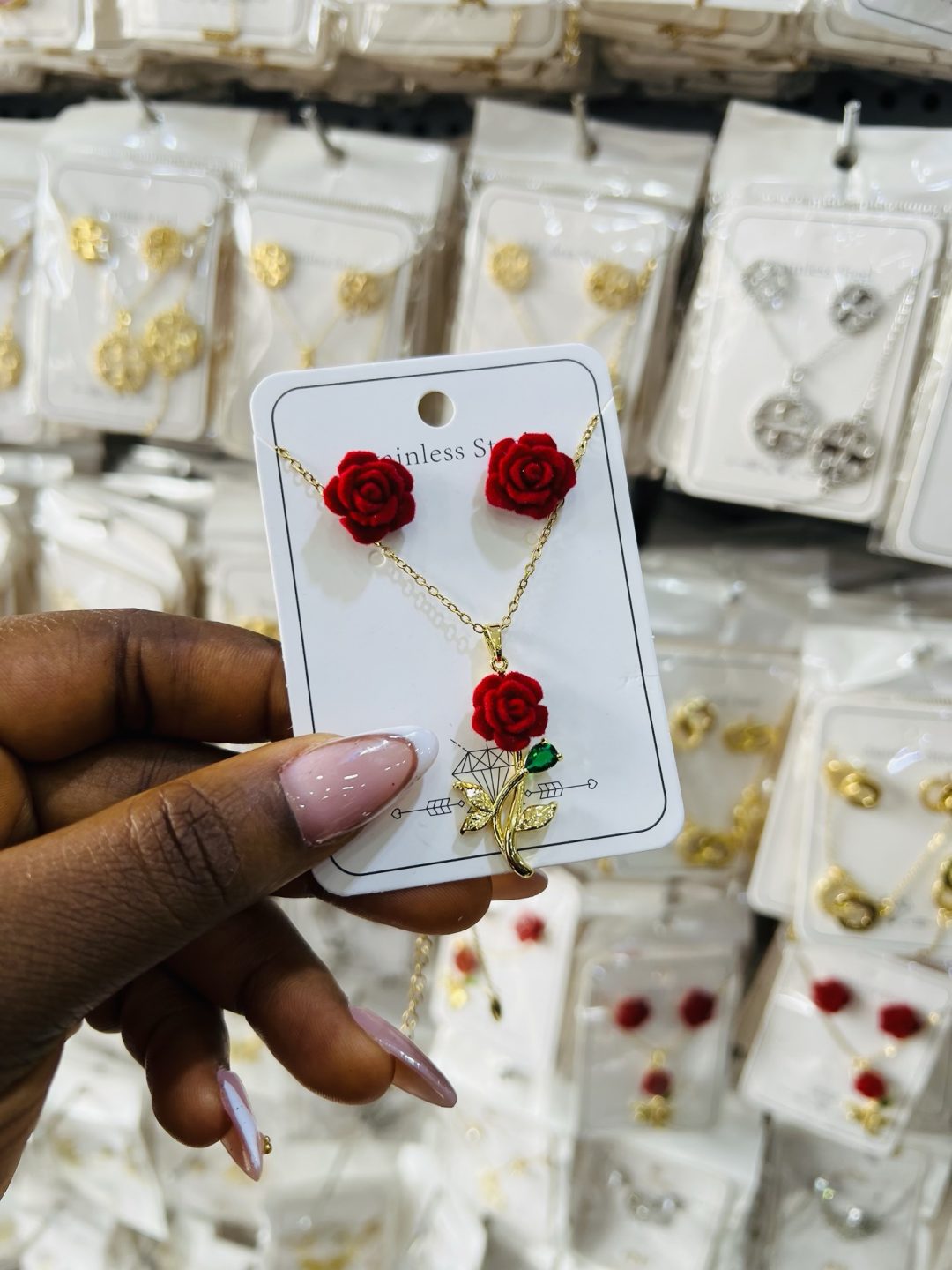 Steel rose necklace and earrings