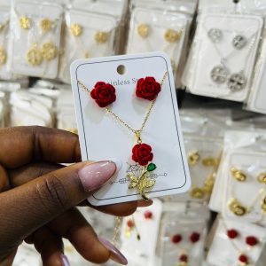 Steel rose necklace and earrings