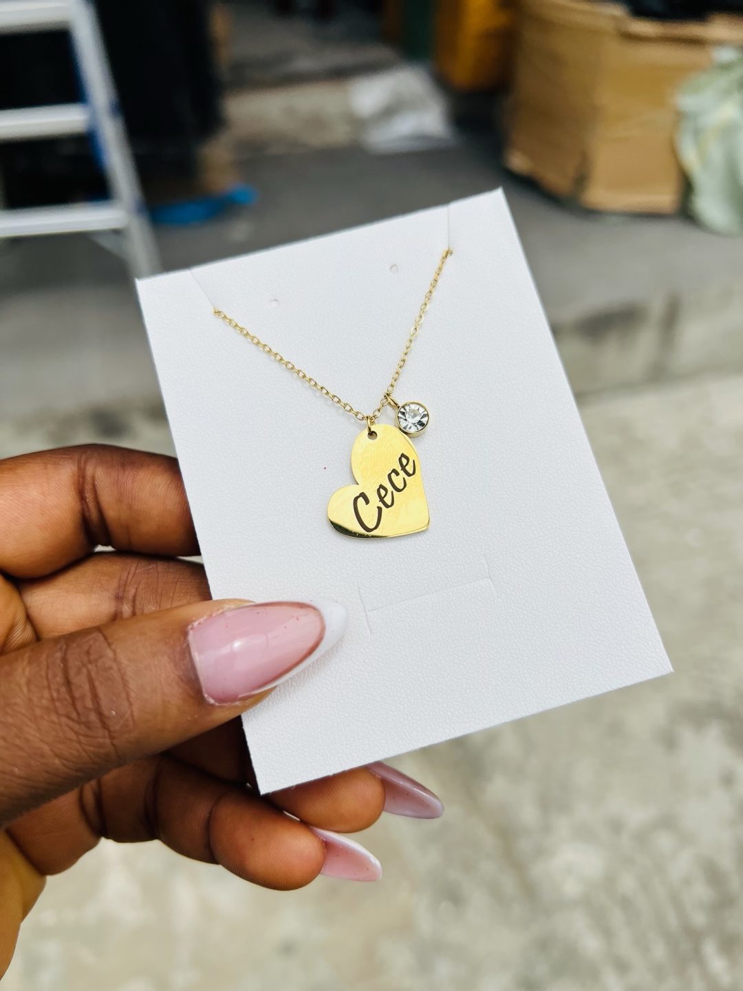 Engraved female heart necklace with gemstone