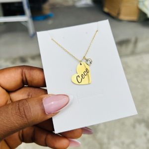 Engraved female heart necklace with gemstone