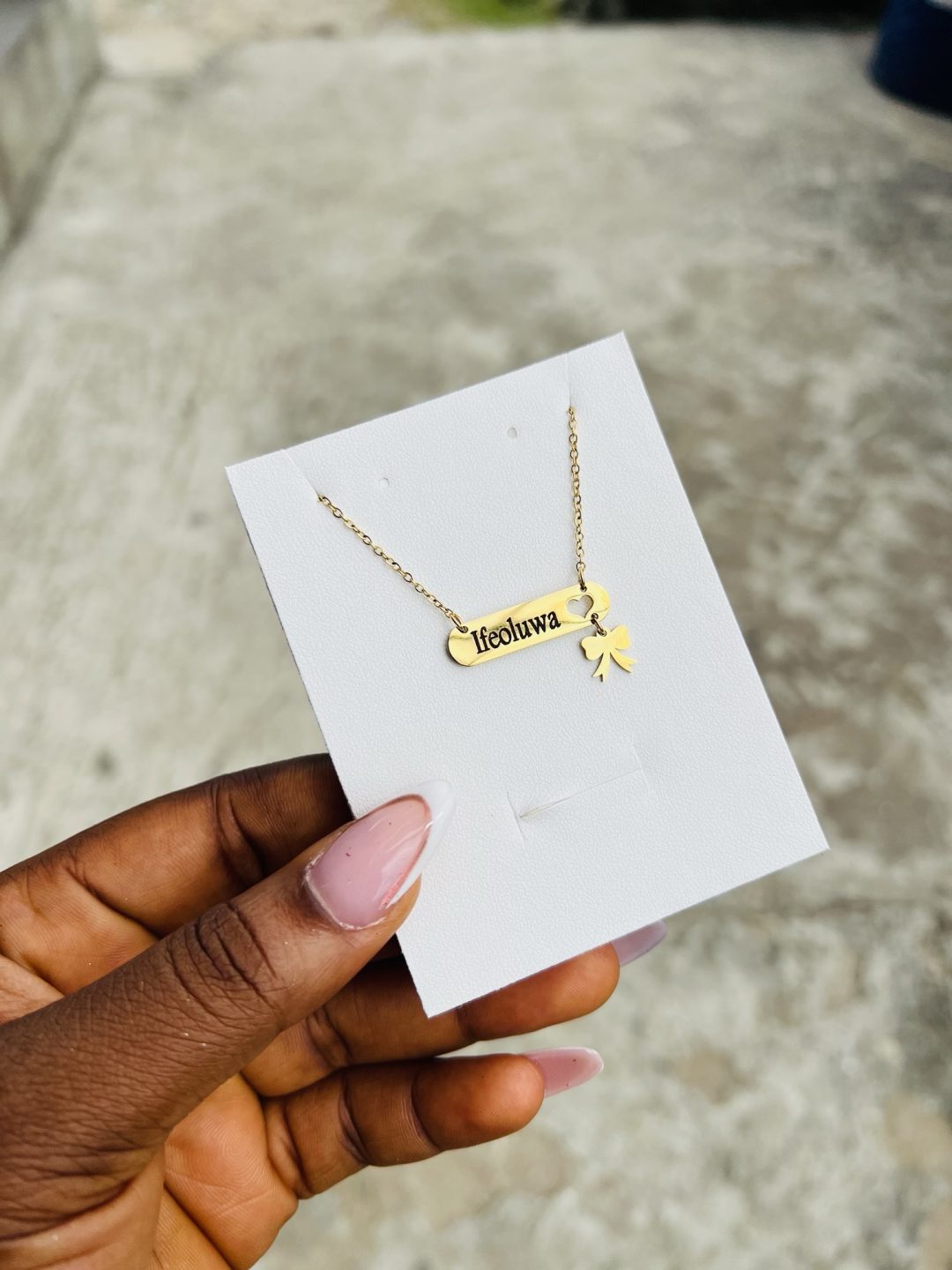 Engraved female bow tie dropping