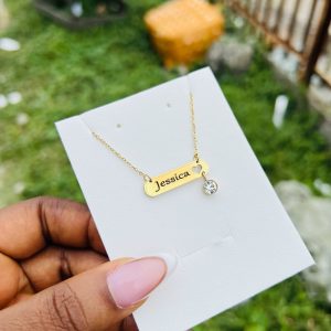 Engraved female flat necklace with gemstone