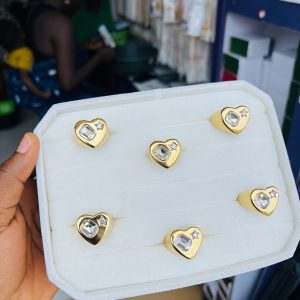A piece of stoned heart steel ring size 10
