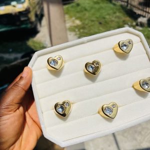 A piece of stoned heart steel ring size 10