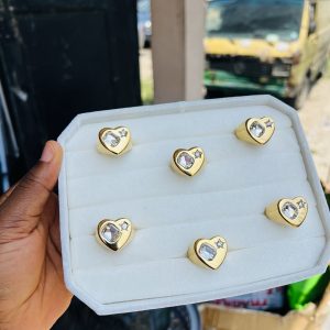 A piece of stoned heart steel ring size 8