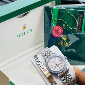 Engraved pink rolex watch and gemstone bracelet with watch box!