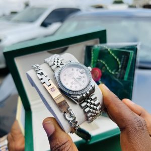 Engraved pink rolex watch and gemstone bracelet with watch box!