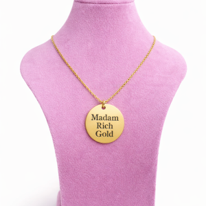 Engraved circle necklace with love charm