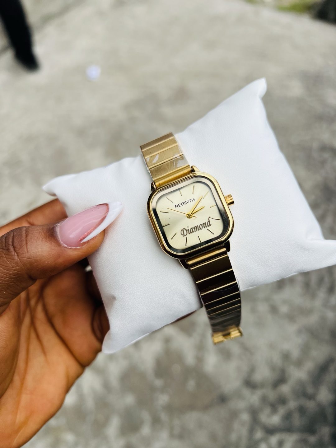 Engraved gold rebirth watch