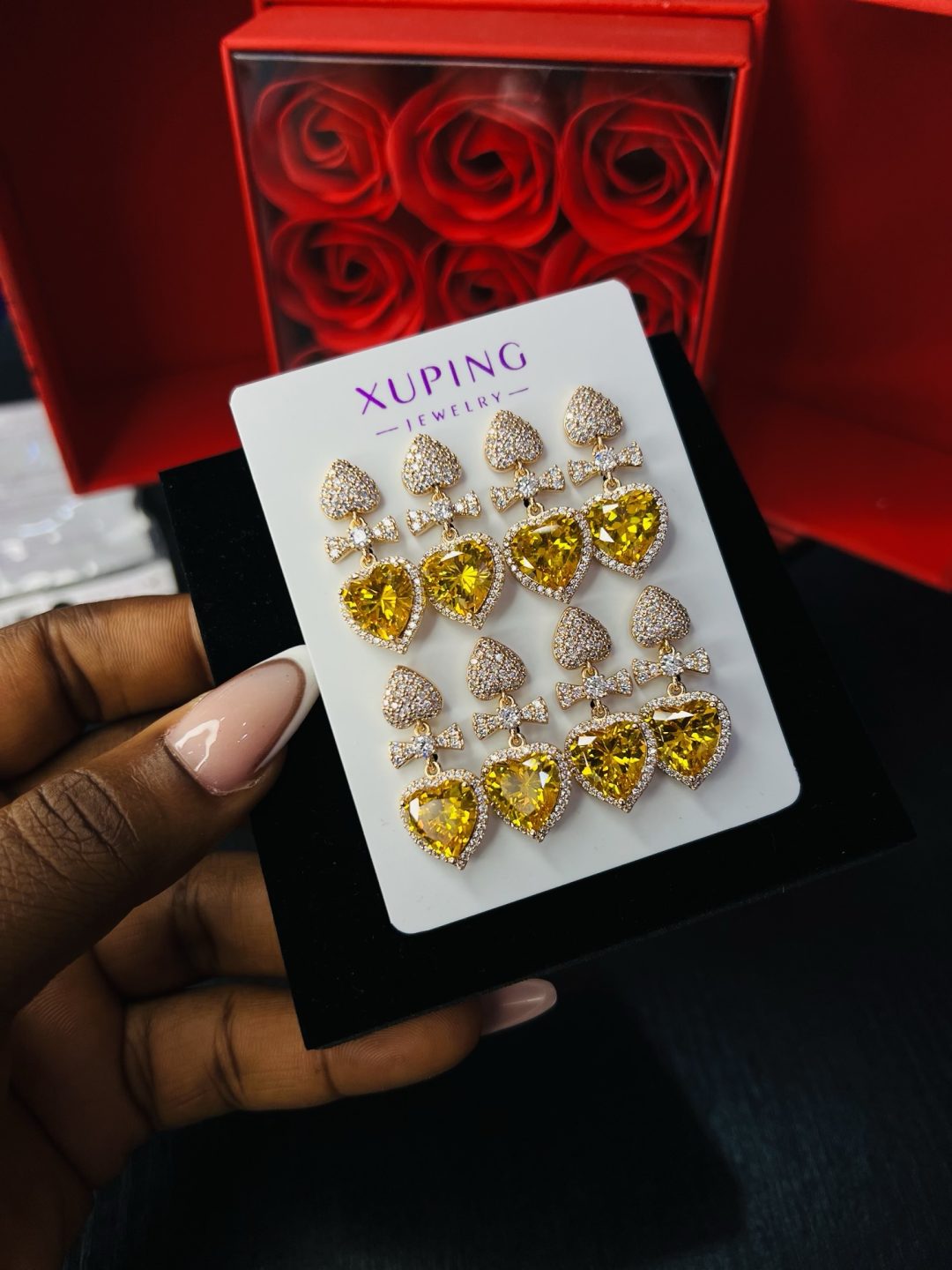 A pair of Xuping emerald stone earrings