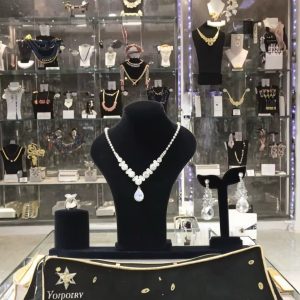 Black suede set display mannequin