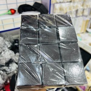 A dozen of black shiny foam box