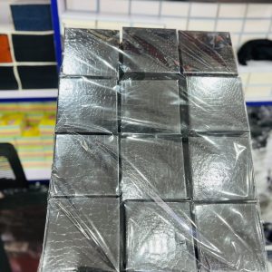 A dozen of black shiny foam box