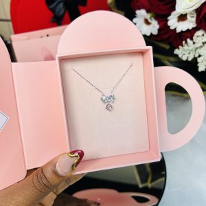 Cz bow tie rhodonite necklace