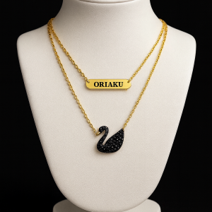 Engraved gold double swan necklace