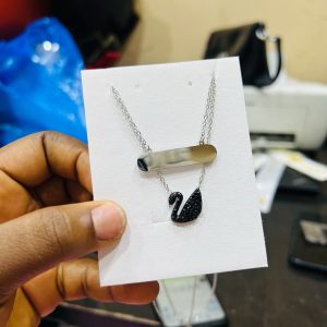 Engraved silver double swan necklace