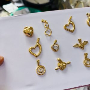 A dozen of Gold replica steel pendant (12)