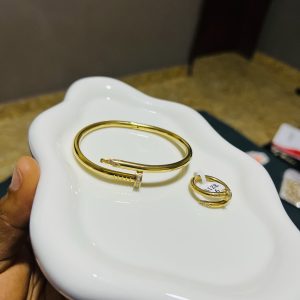 Cartier Stoned nail bracelet and ring