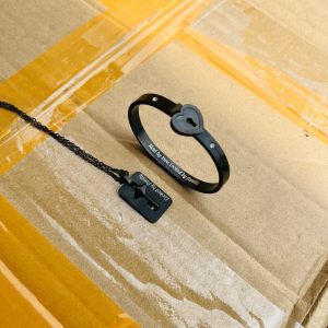 Engraved black necklace and bracelet lock