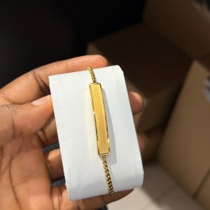 Engraved gold brush bracelet with paper box