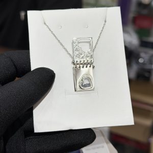 Engraved silver black locket necklace with paper box
