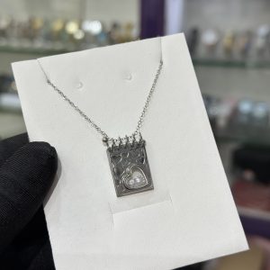 Engraved silver white locket necklace with paper box