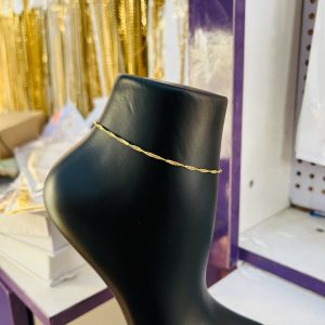 Tiny twirl gold anklet