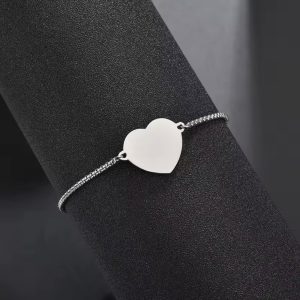 Engraved silver heart bracelet with paper box