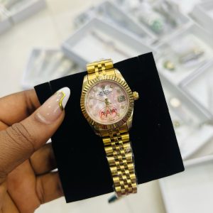 Rolex gold stoned pink face
