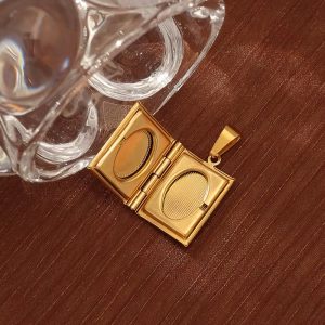 Gold booklet locket necklace with paper box